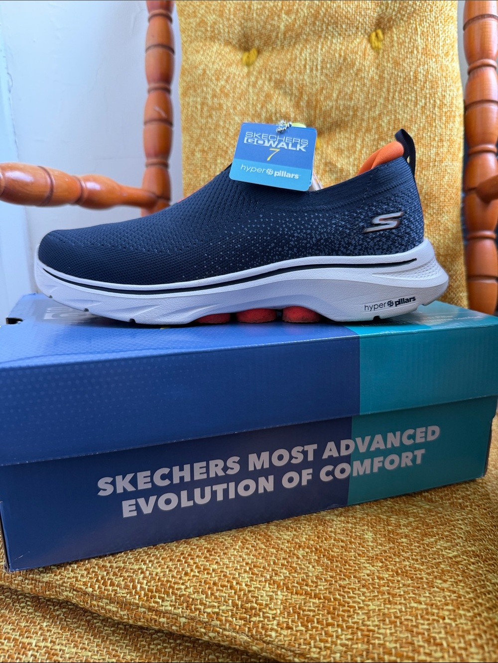 Skechers GOwalk Navy Slip-On Sneakers with Orange Accents